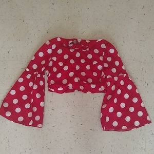 Red blouse with polka dot details